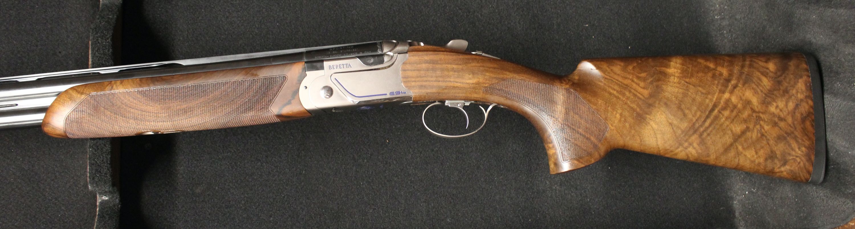 694 Sporting 12 gauge 32